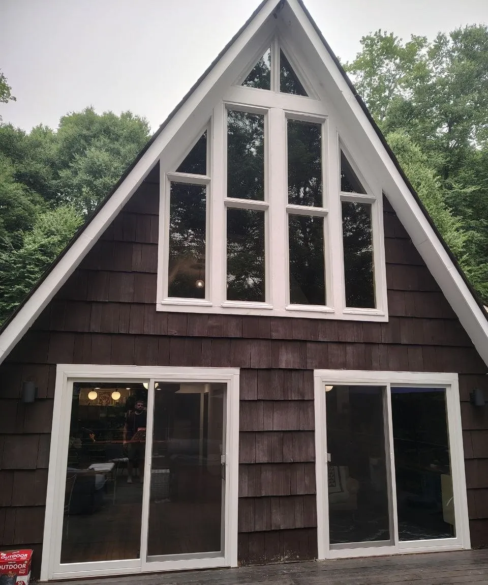 Specialty window wall: A-frame gable, East Stroudsburg area. Installed by HomeTrust Windows & Doors.