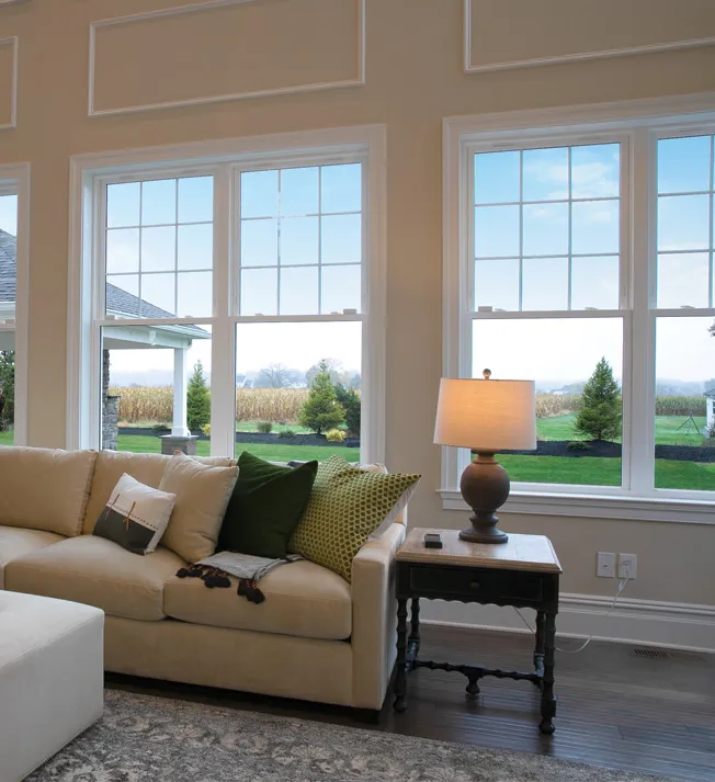 OKNA Eco-Pro 600 Series double hung windows in a bright living room
