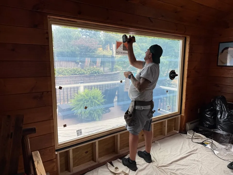 Picture window install: Our crew setting a large fixed unit. Installed by HomeTrust Windows & Doors.