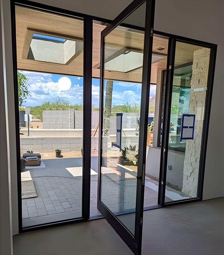 Modern glass doors with outdoor view