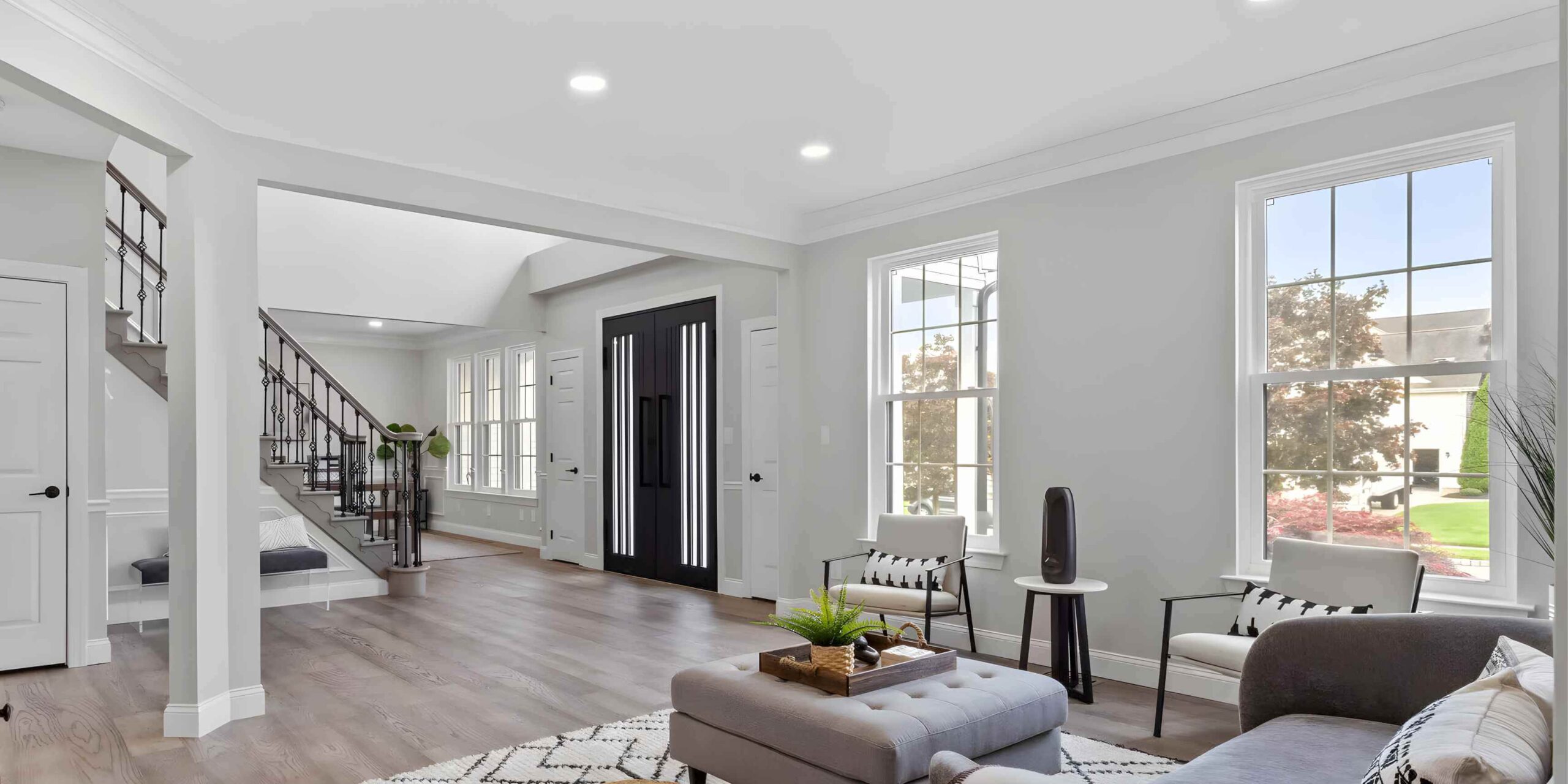 Living room in a Pennsylvania home with new double hung energy efficient replacement windows installed by HomeTrust Windows and Doors